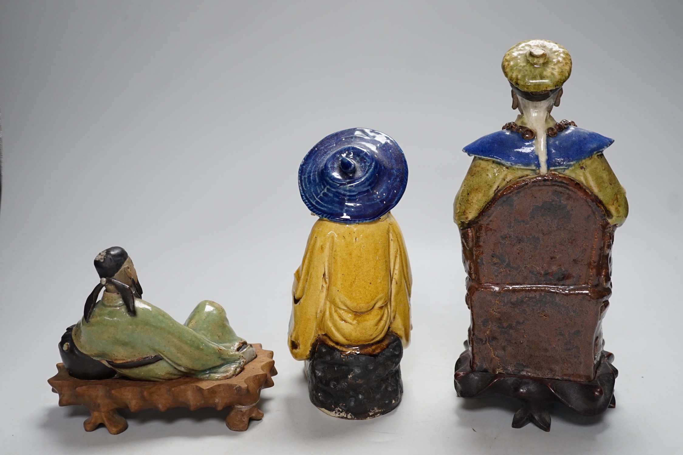 Three Chinese Shiwan pottery figures of an Emperor, Li Bai and an old man, tallest 23cm